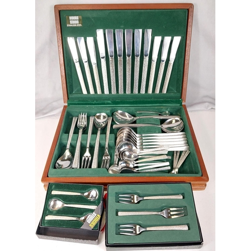 664 - A Viners Studio 6 setting canteen of stainless steel  cutlery with bark effect handles in fitte... 