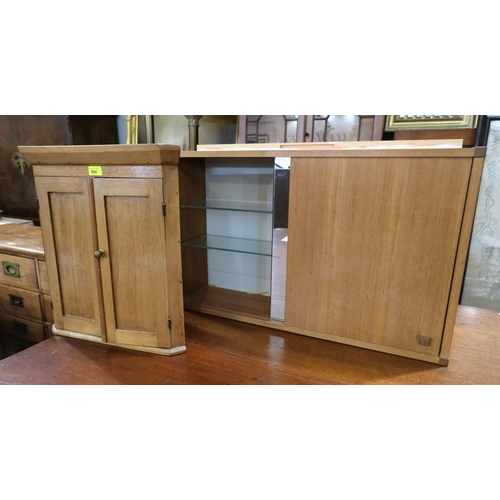 864 - A small pine corner cupboard, double door; a lightwood bedroom chair and a mahogany dining chair wit... 