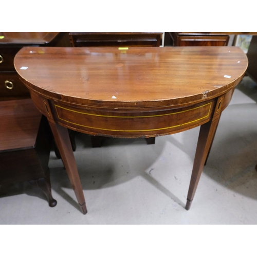 899 - A late 19th/early 20th century mahogany demi-lune fold over inlaid card table