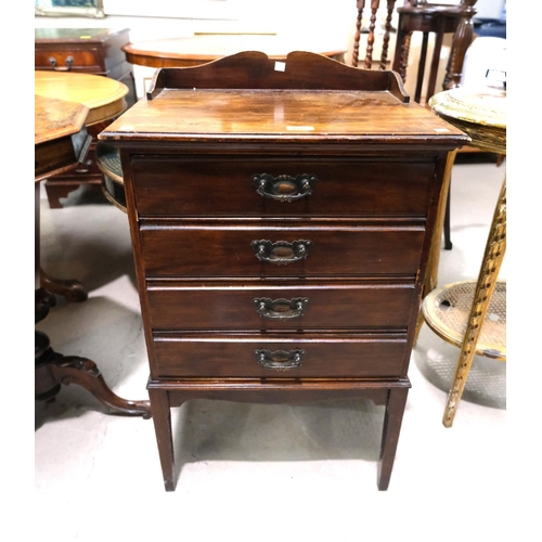 932 - An Edwardian 4 drawer stained wood music cabinet.