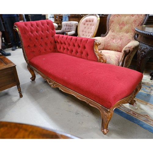 962 - A Victorian style chaise longue on cabriole legs, upholstered in red.