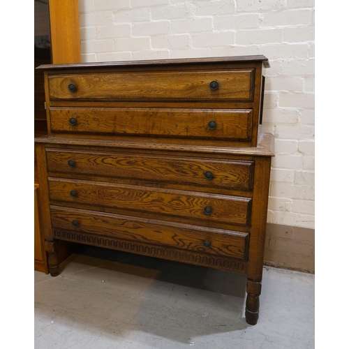 979 - A golden oak chest of five drawers, stepped top, two drawers, 108 x 107cm