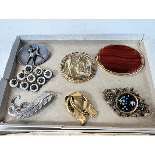 764 - A collection of costume jewellery brooches etc 