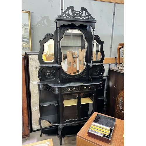 994 - A Victorian ebonised mirror back display cabinet with glazed doors and shelves to either side