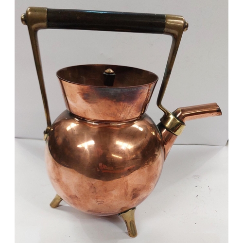 29 - CHRISTOPHER DRESSER, a copper and brass kettle of spherical form with hardwood handle, with orb back... 