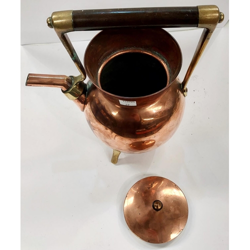 29 - CHRISTOPHER DRESSER, a copper and brass kettle of spherical form with hardwood handle, with orb back... 