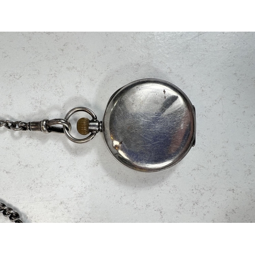 747 - A silver open face fob watch one white metal chain with white enamel dial 