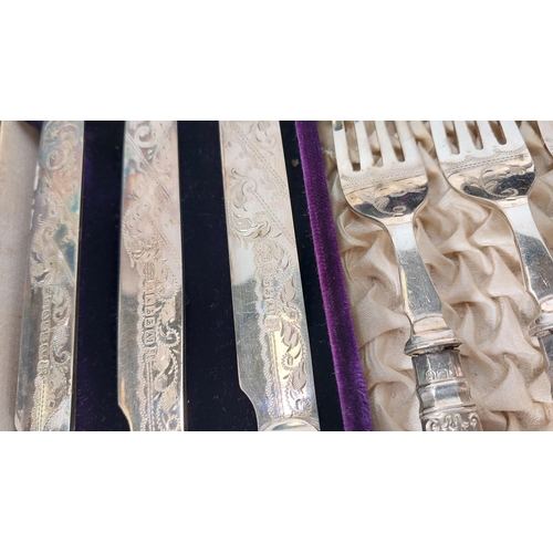 670 - A cased set of silver handled fish knives and forks, a boxed set of silver handled tea knives.