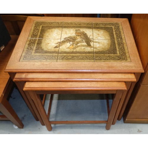 1010A - A nest of mid 20th century Danish teak tile top tables by Mobelfabrikken Toften with falcons