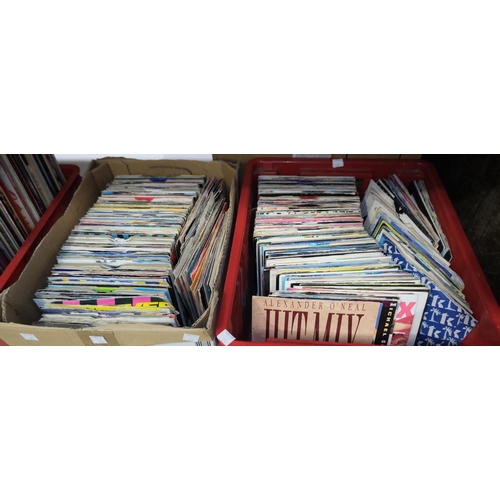 25 - A large collection of singles, rock and pop music 1970's onwards