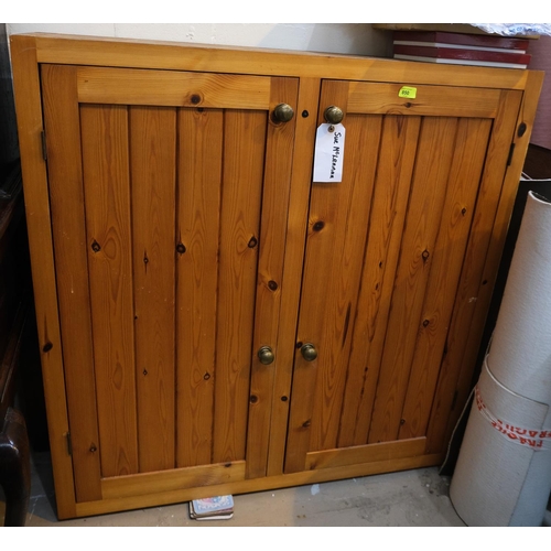 850 - A pine two door side cabinet with brass handles, length 106 x 108 x 30cm