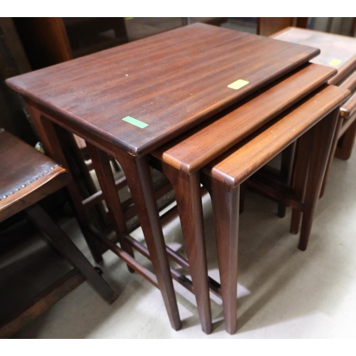 854 - A nest of three mid century teak occasional tables with tapering legs