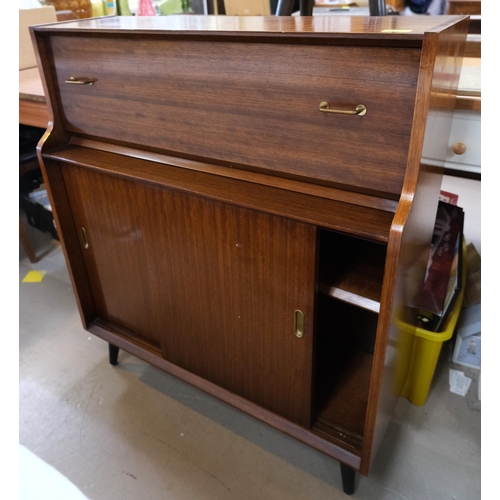 857 - A mid 20th century sapele side cabinet with fall front writing and letter rack with double sliding d... 