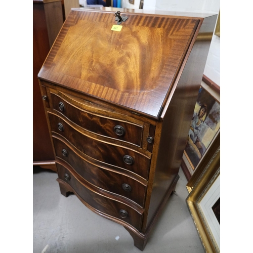 887 - A reproduction mahogany fall front bureau with fitted interior, crossbanded decoration and 4 drawers... 