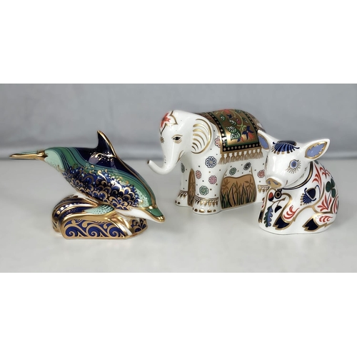 539 - 3 Royal Crown Derby animals: A limited edition elephant, a piglet and a baby dolphin.  Gold stoppers... 