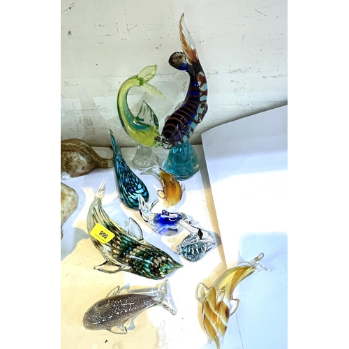 568 - A Murano fish on wave base; a selection of Murano style fish and marine animals including dolphins e... 