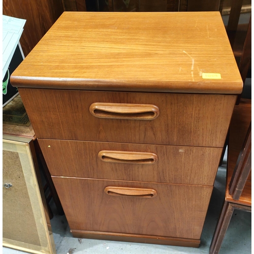 1006 - A teak bedside chest of three drawers