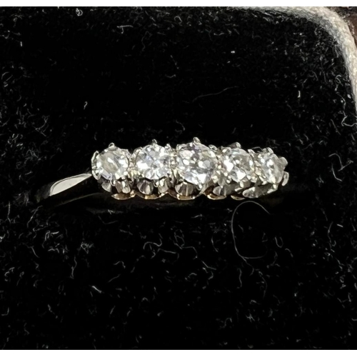 745 - An 18ct gold 5 stone diamond ring graduating sizes