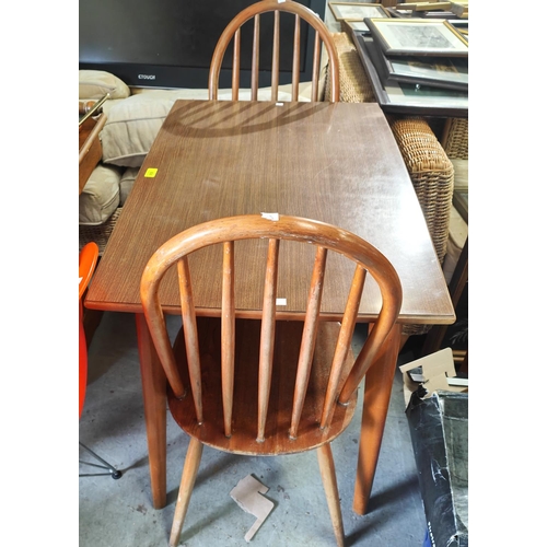 958 - A set of 4 elm and beech hoop and stick back dining chairs and a rectangular wood effect kitchen tab... 