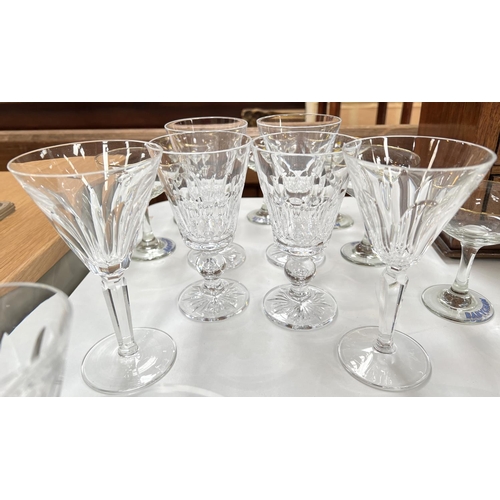 633 - A selection of slice cut Waterford glasses, Babycham and other similar glassware