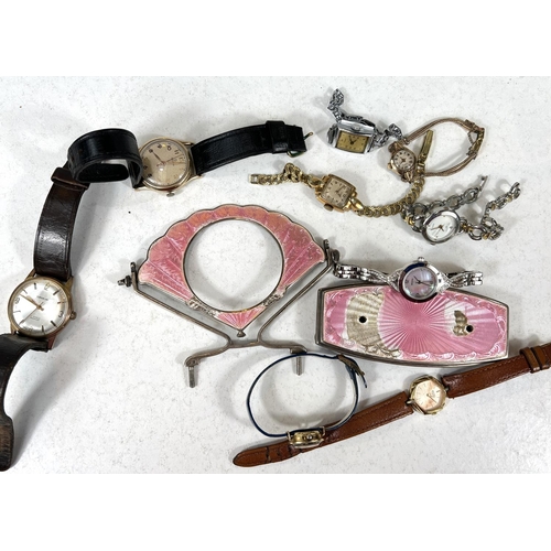 694A - A pink enamel and silver bedside photo frame (a.f and a selection of watches