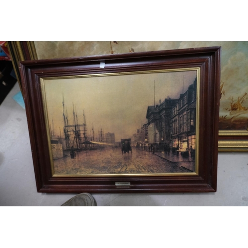 56A - A print of Ships framed in gilt and a street scene framed