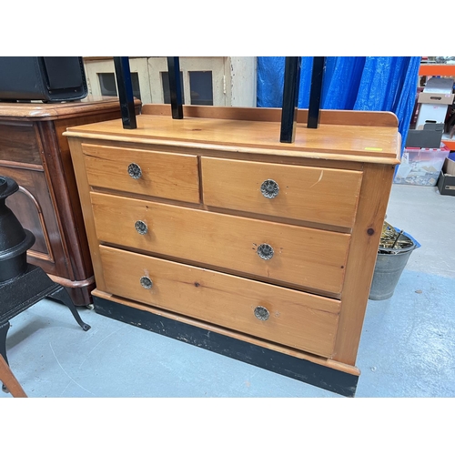 1005 - A stained pine chest of drawers two long two short drawers