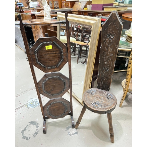 917 - A carved oak spinning chair and a 3 height oak cake stand