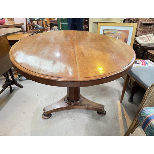 997 - A 19th century mahogany tilt top breakfast table with octagonal column and tripod base