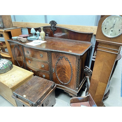 1007 - A mahogany Queen Anne style sideboard with double cupboard and three central drawers on ball and cla... 