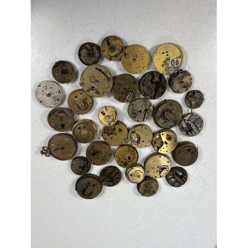 754 - A collection of various pocket watch movements and parts etc