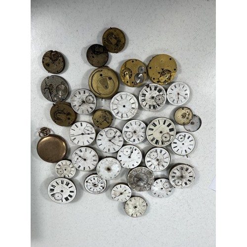 754 - A collection of various pocket watch movements and parts etc