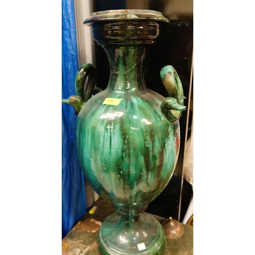 187 - A large Romanesque green drip glaze vase with snake type handles to each side (restored), a large co... 