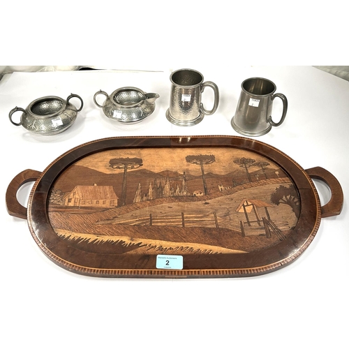 2 - An Arts & Crafts continental parquetry ware inlaid oval tray with country scene and a selection ... 