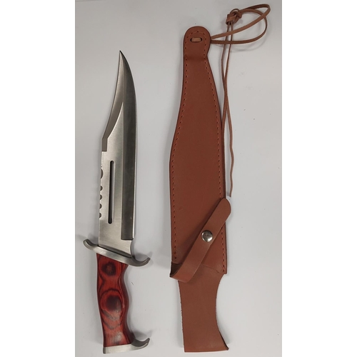 209 - A Hibben Knives 'Rambo III' Bowie knife with polished wooden handle, blade length 28cm with tan colo... 