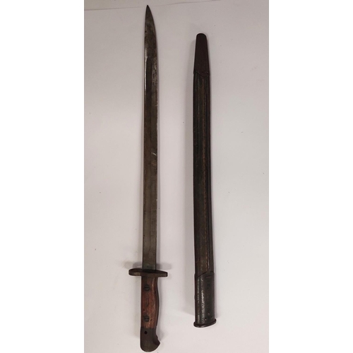 213 - A British 1907 pattern bayonet, single edged with crown stamp Wilkinson blade length 43cm with sheat... 