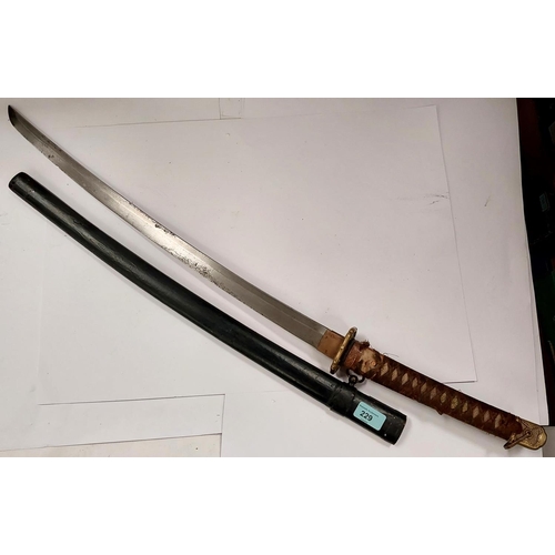 229 - A JAPANESE sword, the blade showing considerable wear, inscribed marks to the tang which is shortene... 