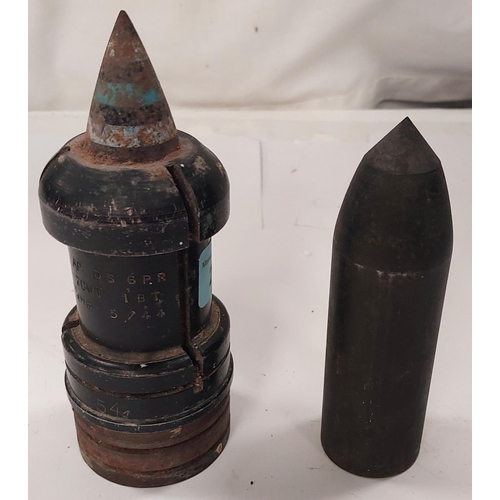 237 - An armour piercing 27mm projectile, stamped 54 with broad arrow, 70 WT 5/44 and another similar roun... 