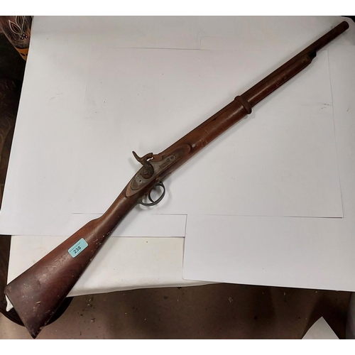 238 - A 19th century Enfield percussion rifle with crown mark to lock plate. With cut down carbine style b... 