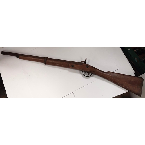 238 - A 19th century Enfield percussion rifle with crown mark to lock plate. With cut down carbine style b... 