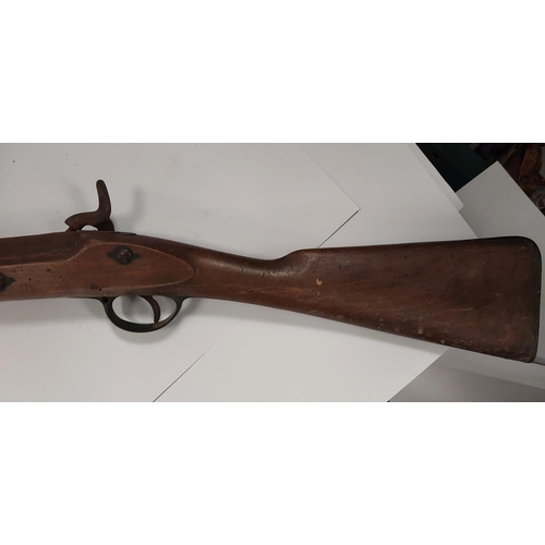 238 - A 19th century Enfield percussion rifle with crown mark to lock plate. With cut down carbine style b... 