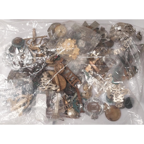 263 - A collection of military badges and buttons etc