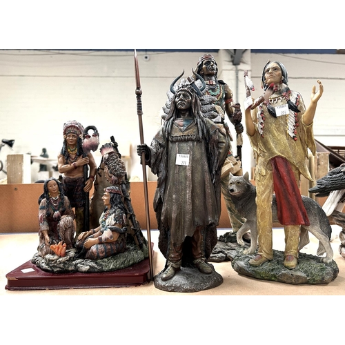 273 - Three modern resin figures of native americans and another depicting a native american scene 