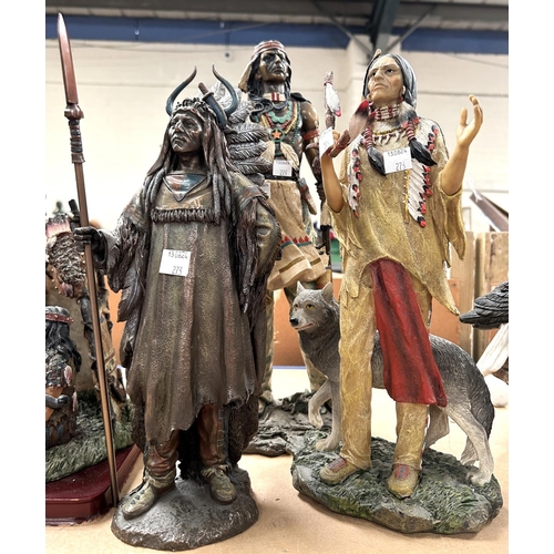 273 - Three modern resin figures of native americans and another depicting a native american scene 