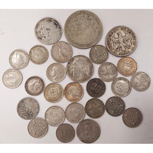 294 - A selection of GB and foreign silver coins.