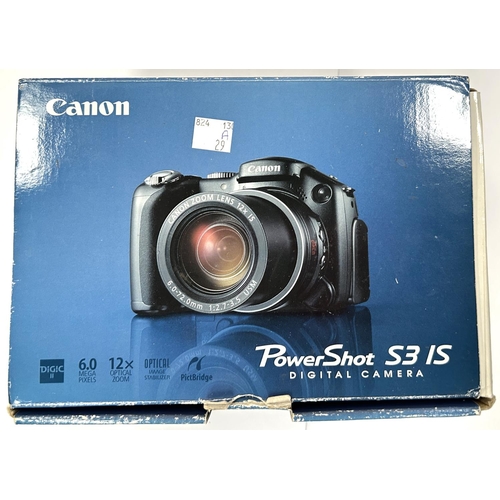 29A - A Canon Power Shot S31S digital camera in original box with instructions.