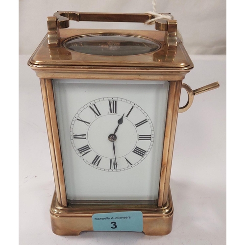 3 - A large brass carriage clock with enamel face, striking movement etc. (glass a.f)