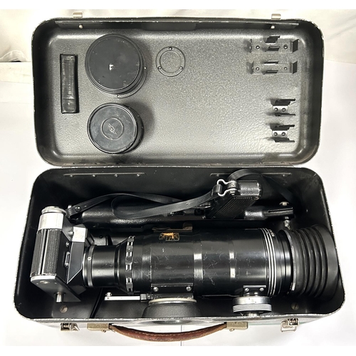 35 - A large USSR made telephoto lens; a Zenit-ES in case; a VHS camera in case and other cameras slide p... 