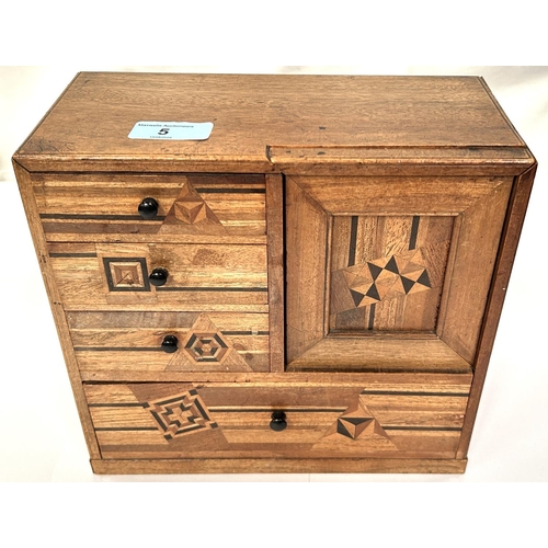 5 - A marquetry inlaid small cabinet with drawers, lift up compartment etc.