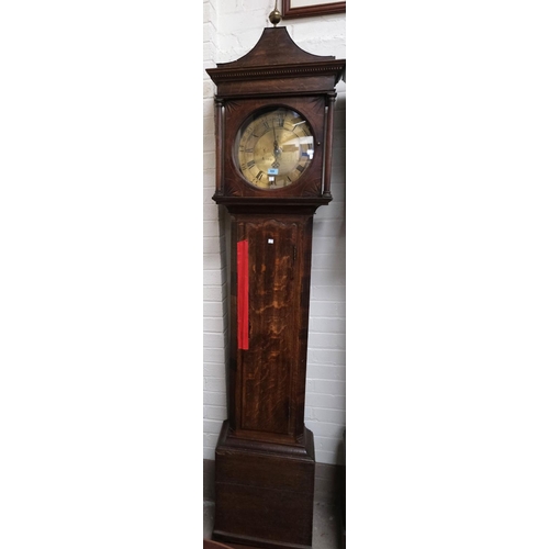 906 - An 18th Century oak longcase clock, the hood with pagoda pediment and turned pillars, full length do... 